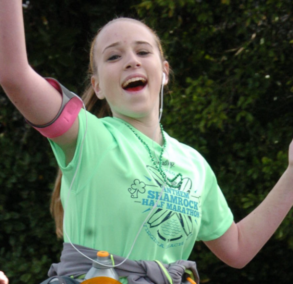 Cameron Gallagher smiling at a half marathon