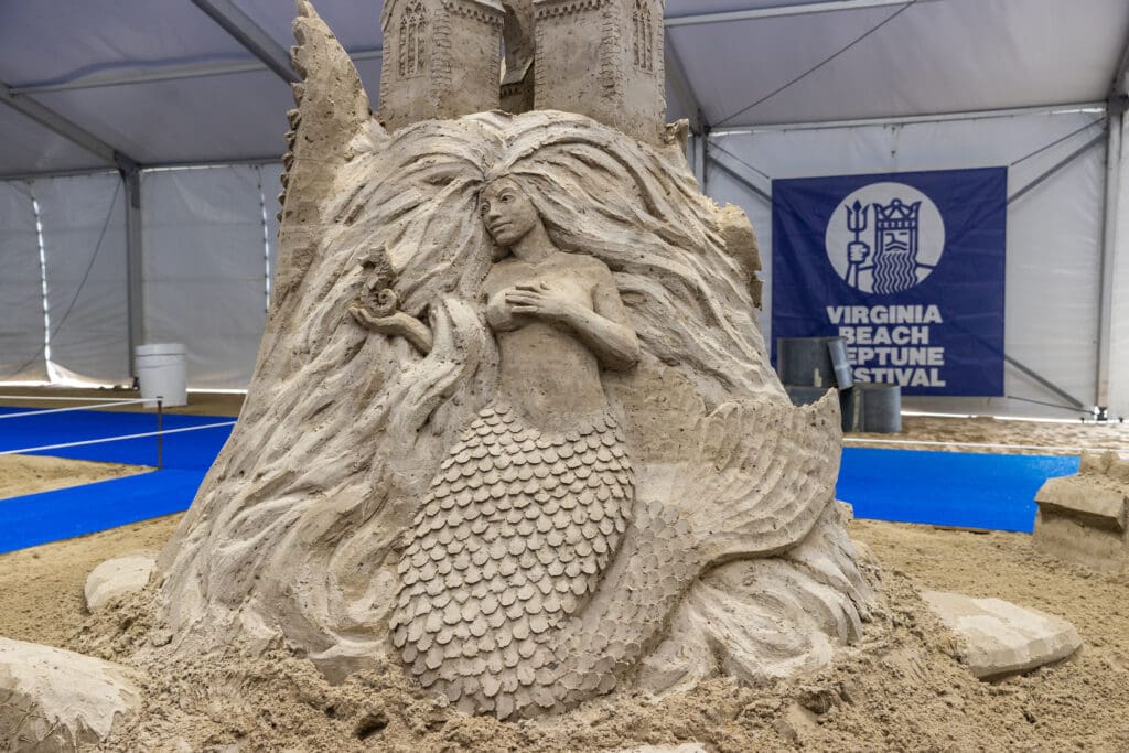 Intricate sand sculpture of a mermaid