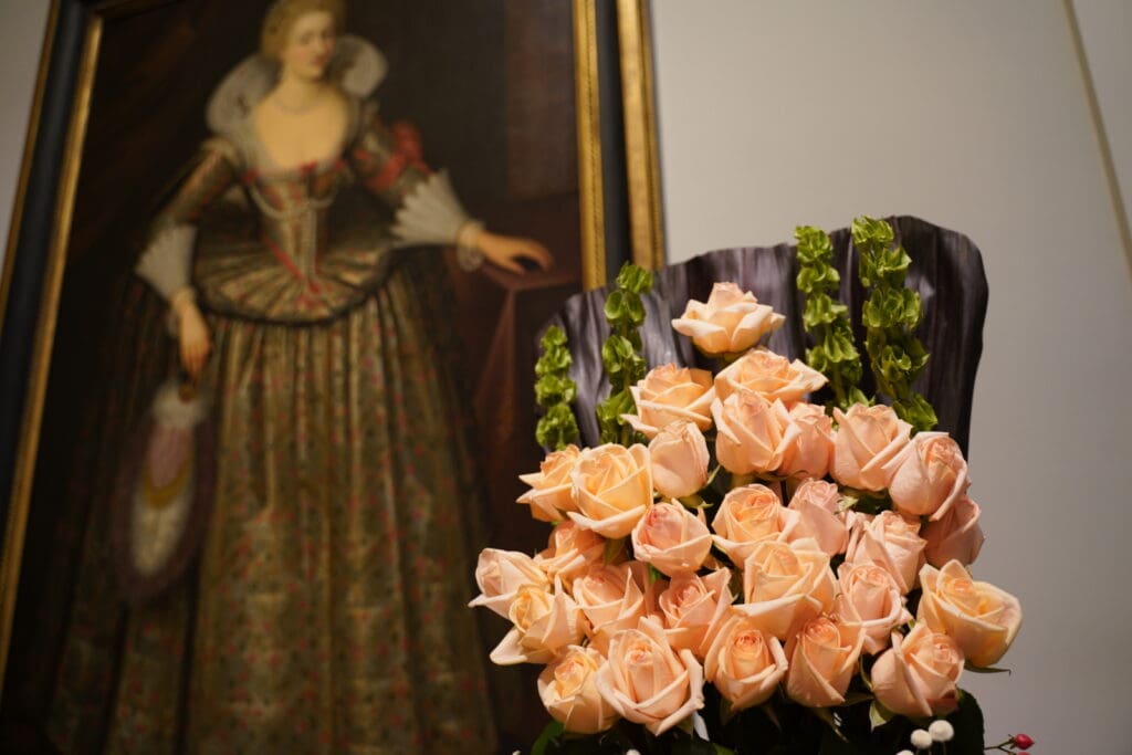 “Queen Anne of Denmark, Wife of James I” (detail), from the workshop of Marcus Gheeraerts the Younger, Flemish. Floral arrangement 