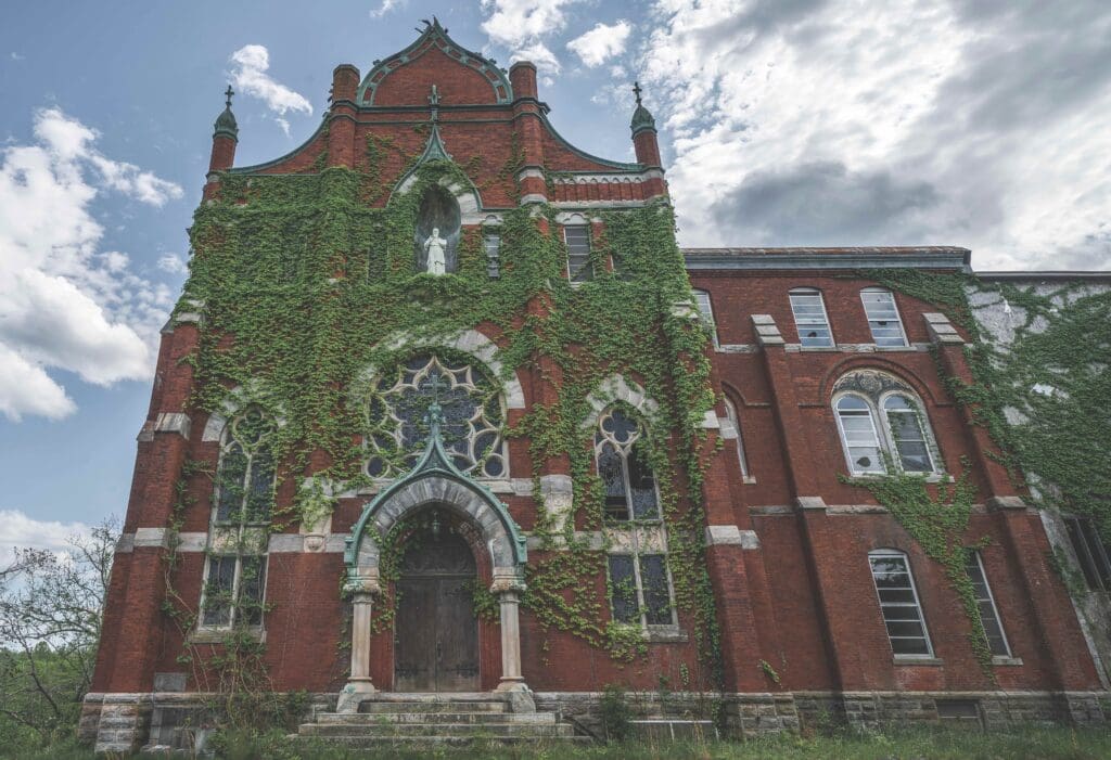 Chapel being consumed by ivy