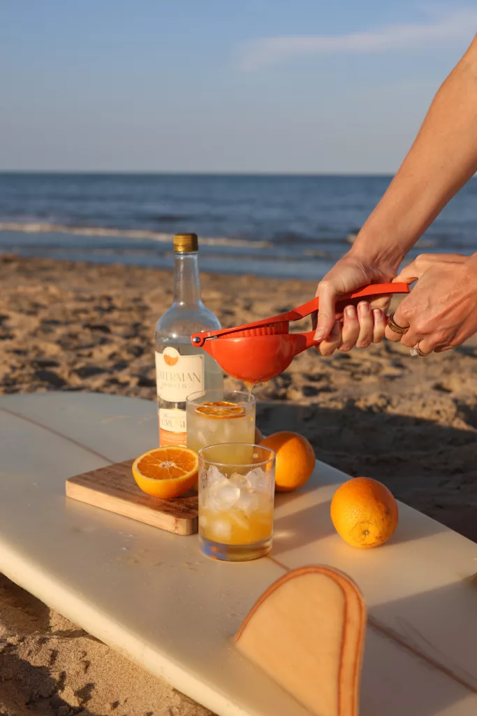 Drinks enjoyed seaside.